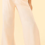 Calça pantalona em alfaiataria glossy