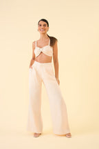 Calça pantalona em alfaiataria glossy